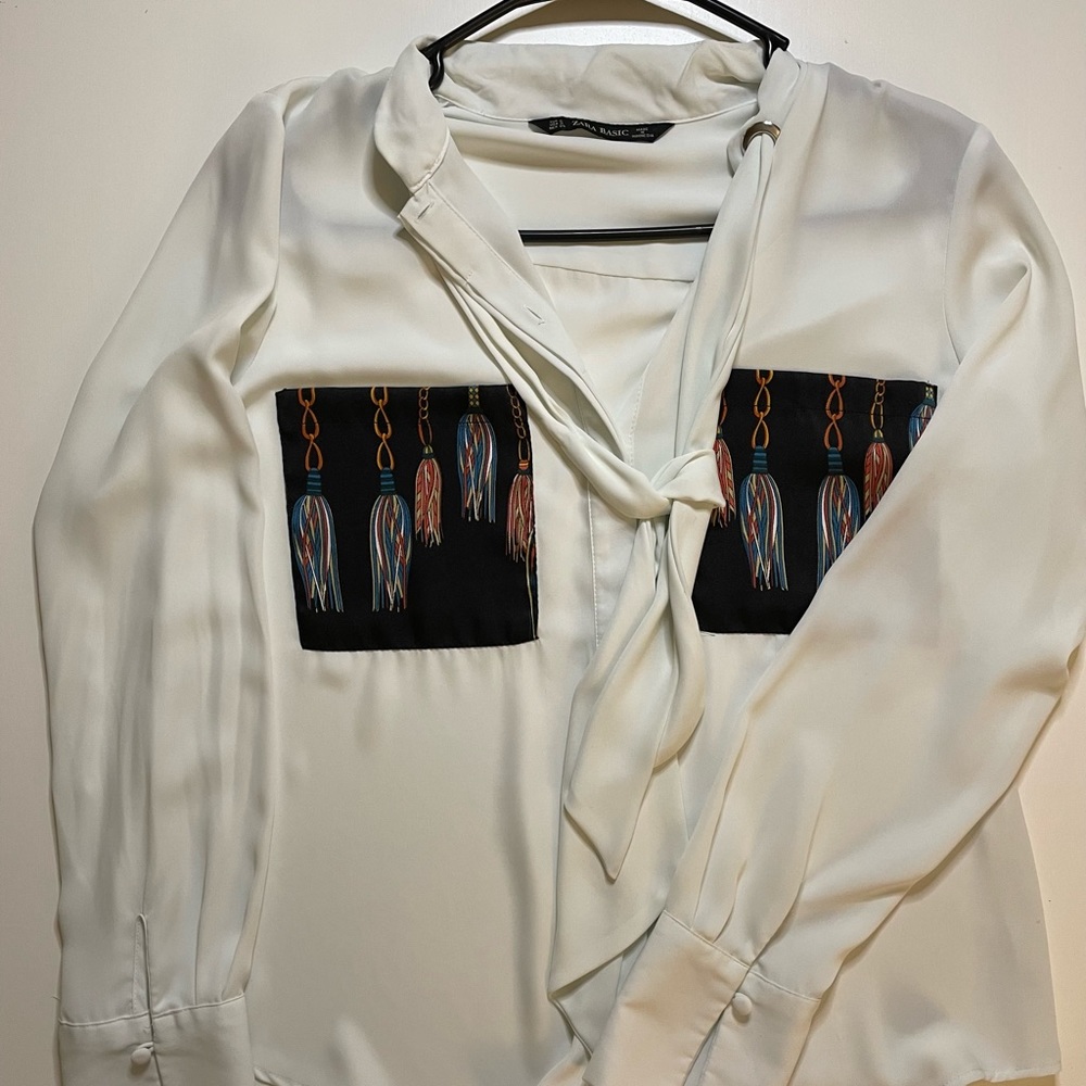 White blouse with printed pockets